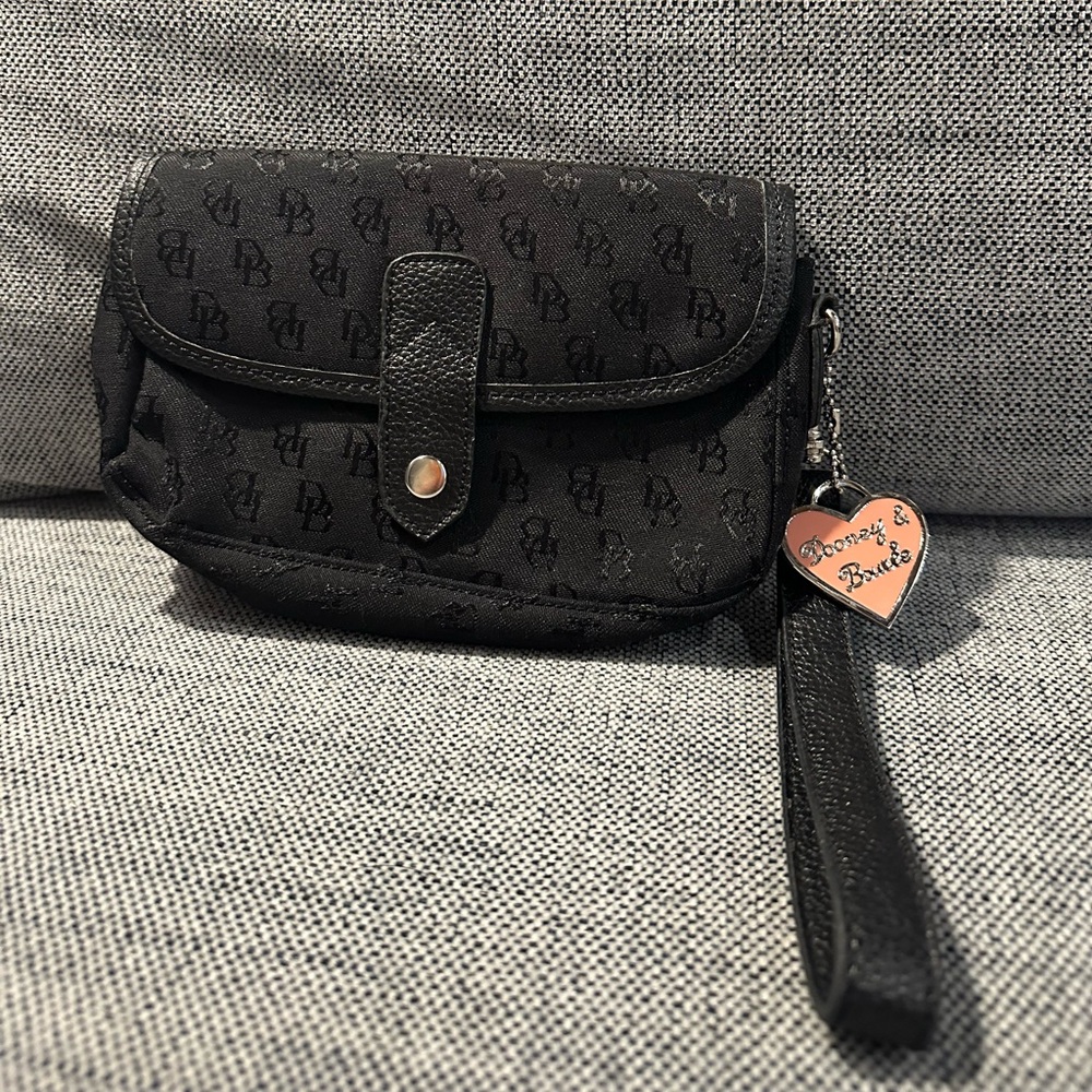 Dooney & Bourke Small Black Wristlet With Pink Charm